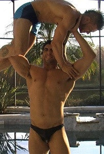 Antonio gorilla presses Angel lift carry bodybuilder pecs arms biceps