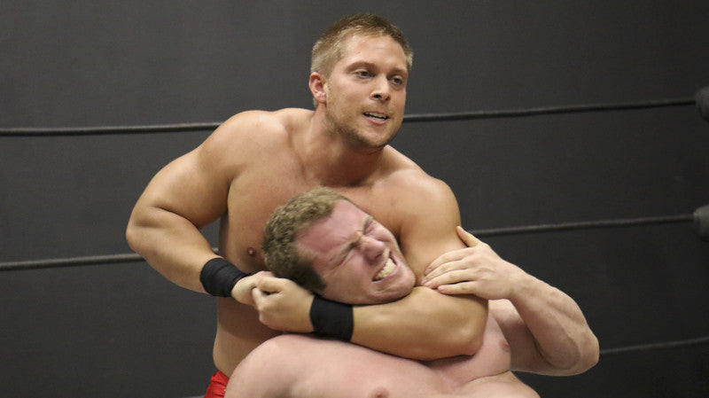 Bucky headlocks Talon