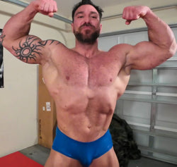 Double bicep flexing thunders bodybuilder