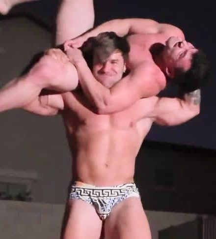 Loki lift and carry another bodybuilder