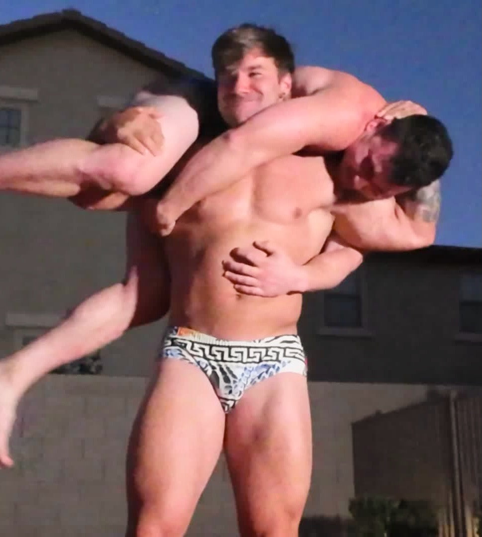 Loki does fireman's carry wrestling move