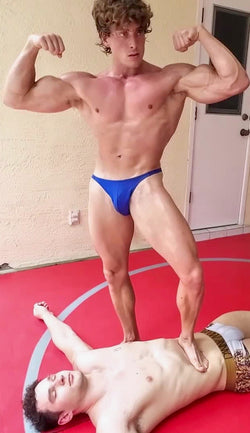 Muscle hunk victory pose