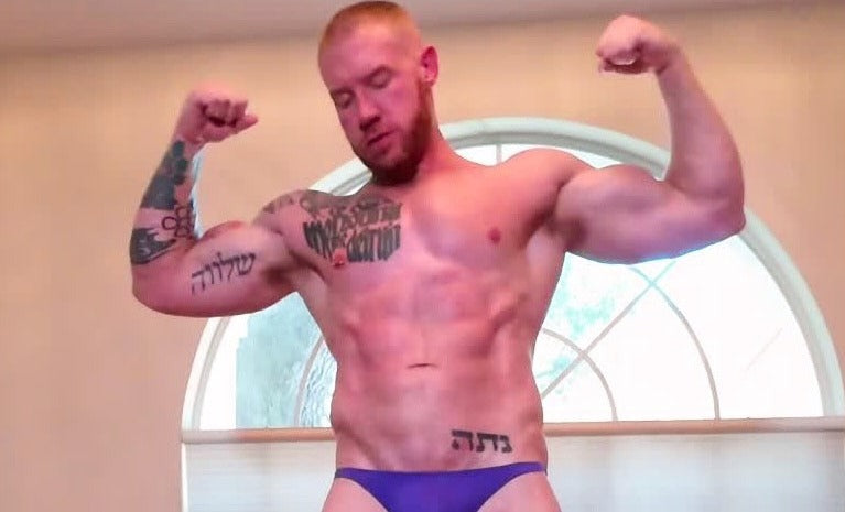 Flexing over opponent 