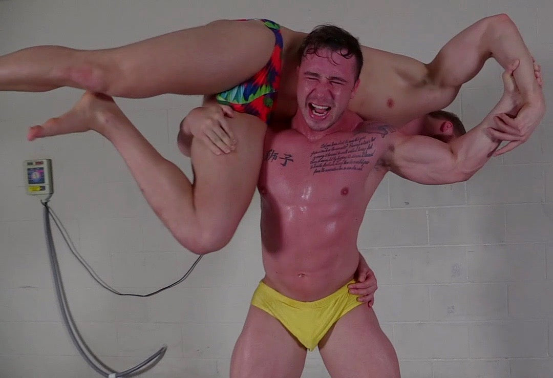 body builder in an over the shoulder carry