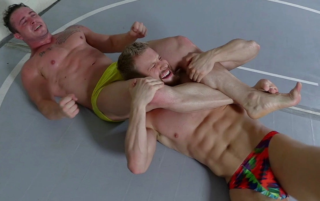 body builder in a head scissor