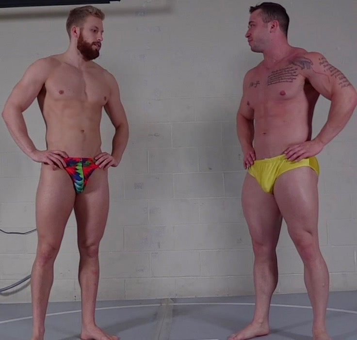 muscular men posing for the camera