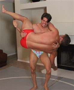 Zman lifts up Mean Mike for a big slam in Thunders Arena