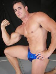 Ace Hanson flexing and showing off massive bicep, chest, arms, and abds