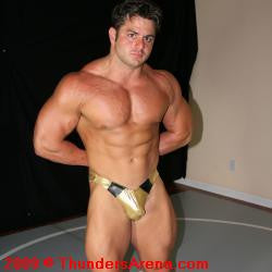 Frank the Tank shows off his huge pecs, giant arms, and amazing abs in Thunders Arena