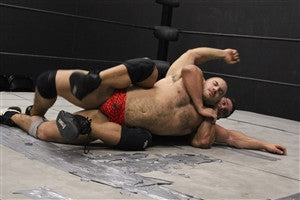 Brian Cage body scissors and chokes Dirty Daddy