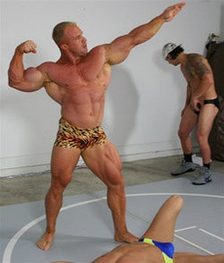 Zman Conan Big Sexy victory pose bicep flex pecs chest