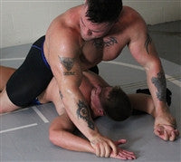 Specimen Logan wrist lock arms biceps pecs tattoos