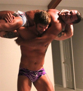 Big Sexy Angelo firemans carry pecs chest