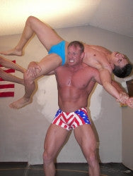 Cesar firemans carry Cody lift abs pecs chest