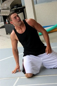 Jack mchawk pose arms wrestling mat