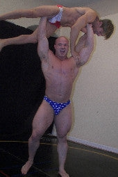 Zman Kyle gorilla press lift carry pecs chest arms abs thighs legs