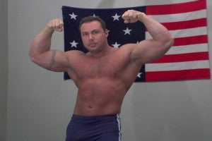 Monstro double bicep flex pecs arms abs bodybuilder