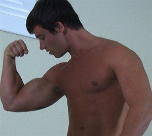 Cody Nelson flexing bicep pecs abs wrestler