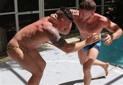 Marco Archer grapple action shot arms tattoos pecs chest