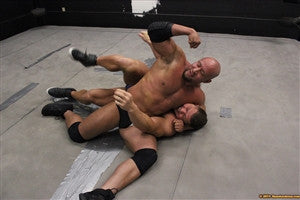 Brute flexes bicep while pinning Johnny Bravo arms pecs