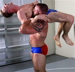 kratos tak Lift and carry over the shoulder backbreaker submission hold submit 