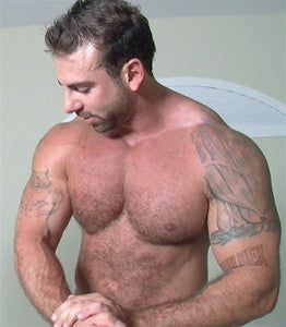 Frank the Tank tattoos pecs chest arms biceps