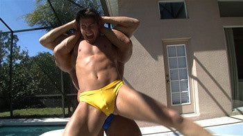 Zman grabbed in a vicious full nelson submission hold by Johnny Bravo in Thunders Arena