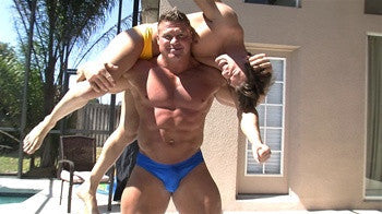 Massive bodybuilder Johnny Bravo lifts Zman with a torture rack submission in Thunders Arena