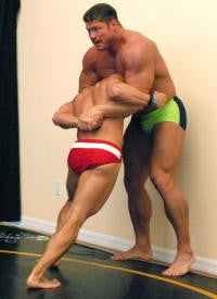 Johnny Bravo Iceman headlock chickenwing hammerlock submission hold submit pain torture