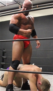 Brute victory pose over TAK bicep flex pecs thighs