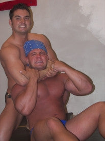 Bomb Batar head lock chest pecs arms