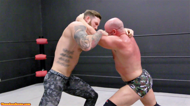 Viking and Brute tie up in the ring at Thunders Arena Wrestling 
