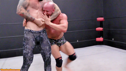 Viking puts Brute into a headlock at Thunders Arena Wrestling 