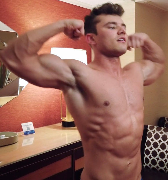 Caffrey double bicep flexing