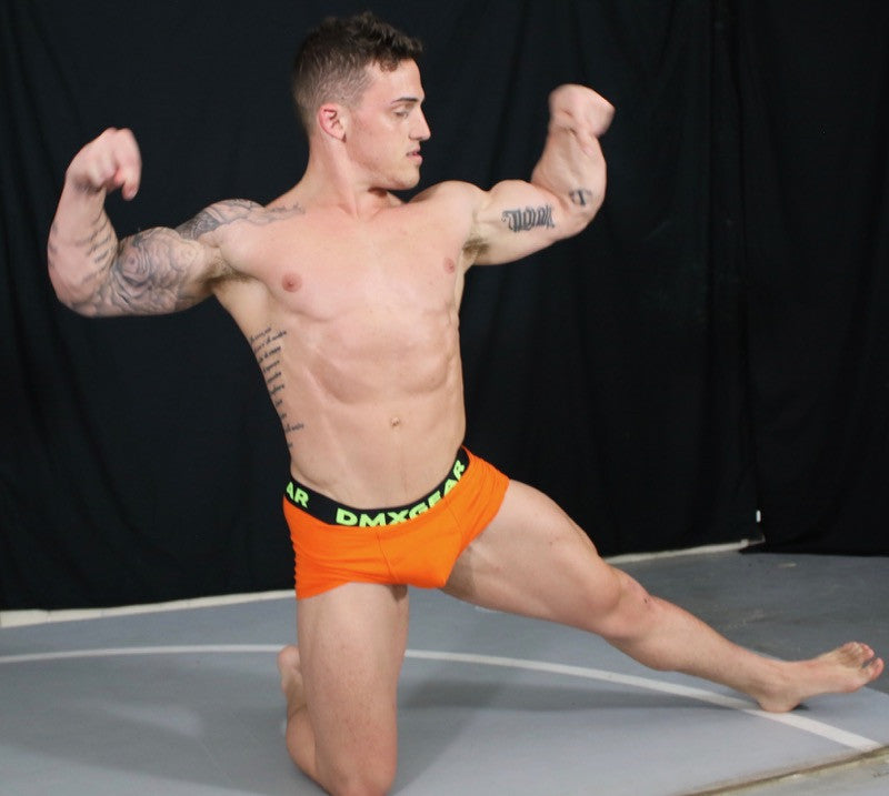 Marco flexing abs flex pose chest pecs arms Thunders Arena 