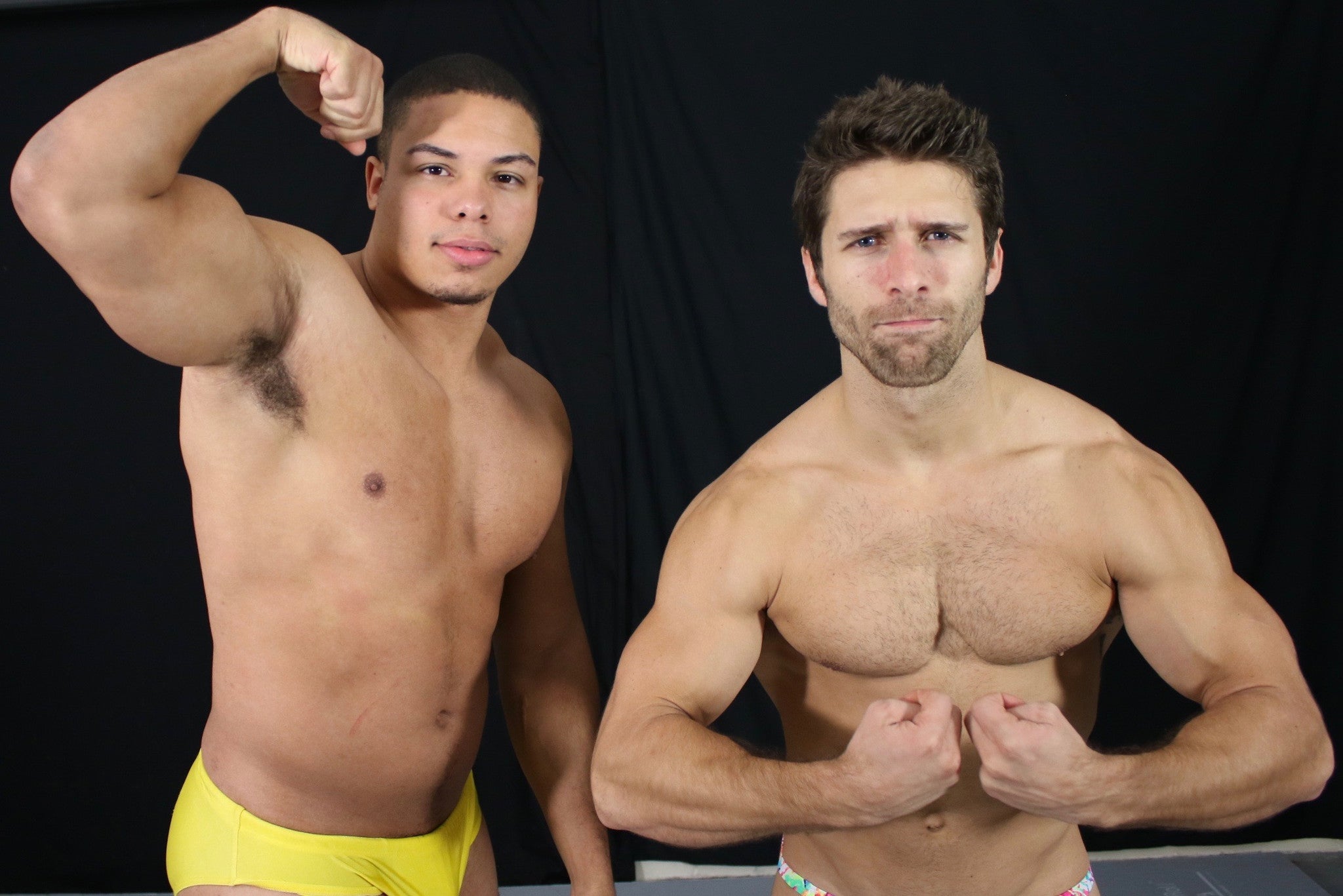 Raptor Blayne flexing pose pecs biceps 