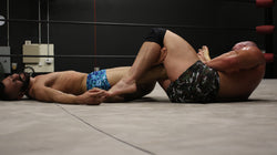 Brute puts Kid Romeo into a ankle submission on Thunders Arena Wrestling. 