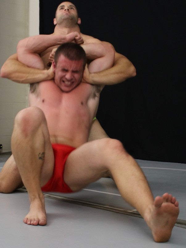 Adam Bryant tortured by Vinny in Thunders Arena with a Full Nelson