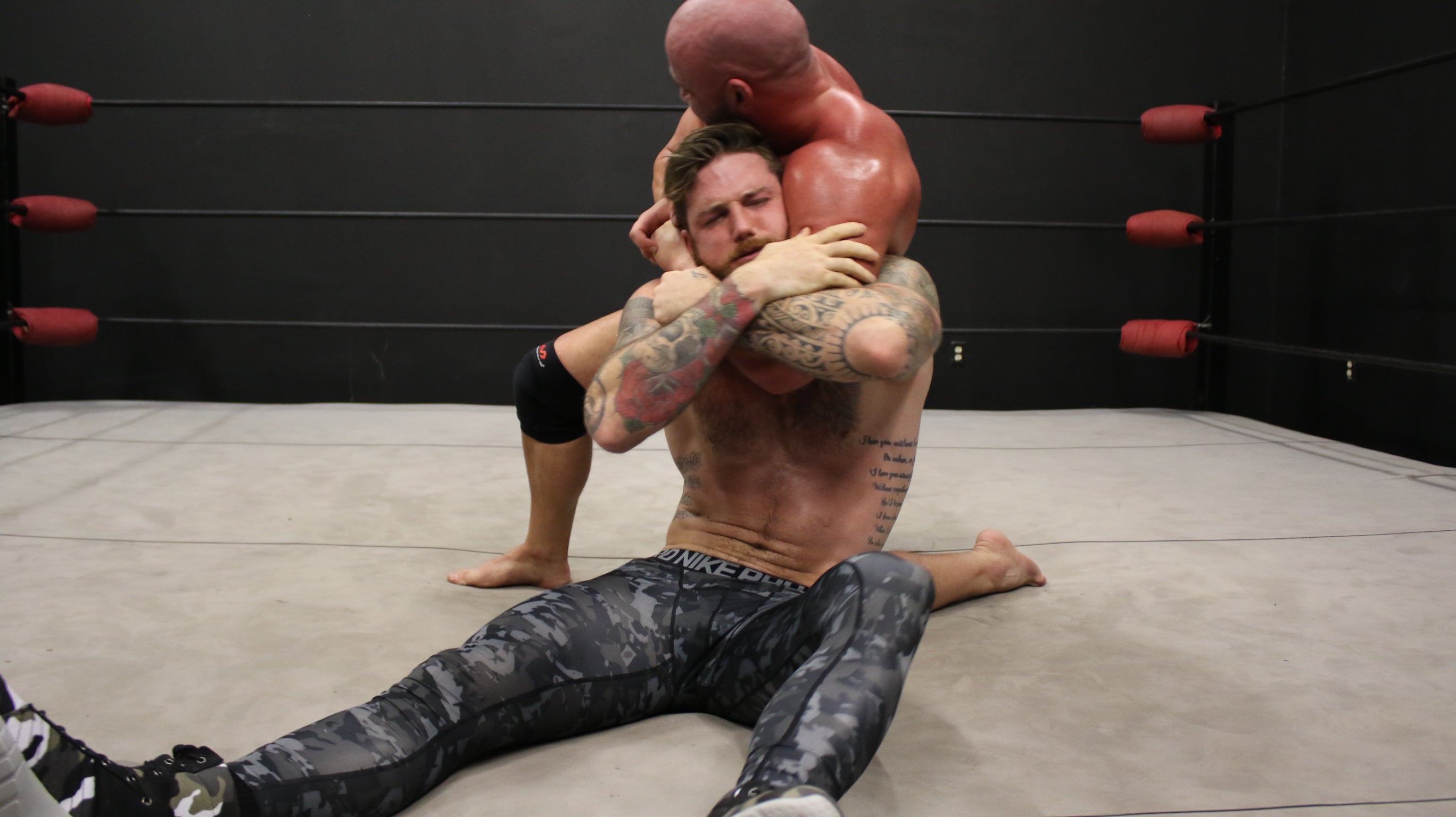 Brute has Viking in a head lock thunders arena 