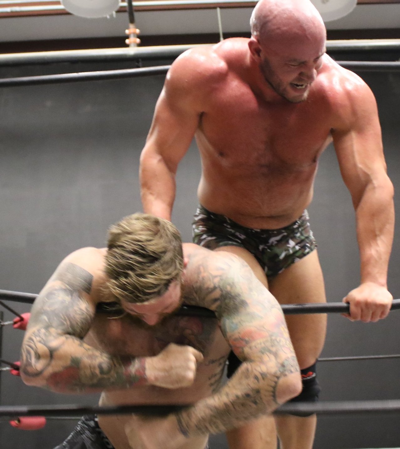 Brute holds Viking down against the ropes on thunders arena