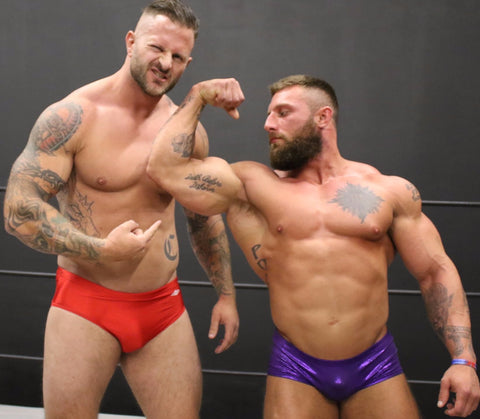 Mack and Tank flex and pose on thunders arena wrestling 