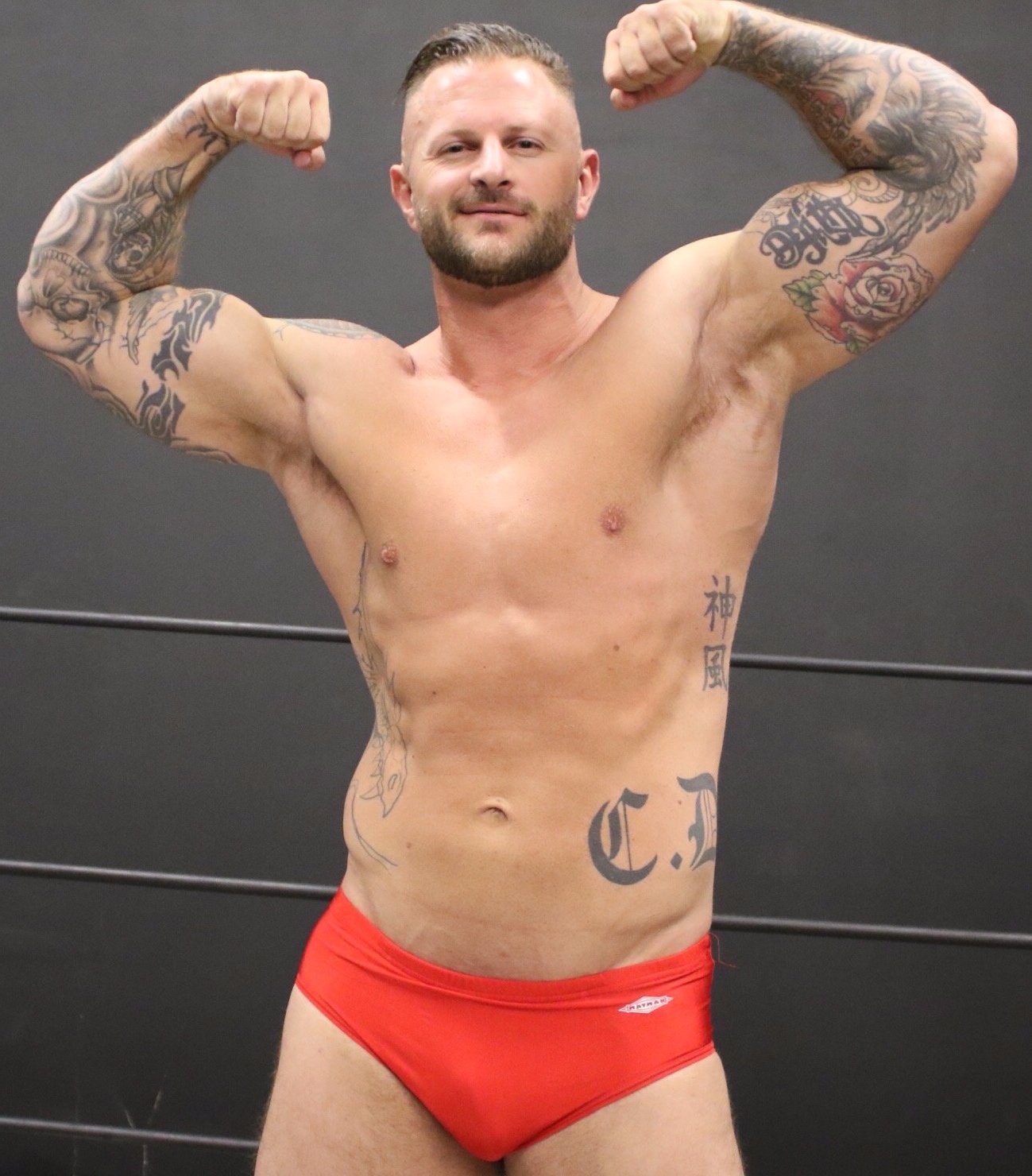 Mack's great chest and abs bicep flex at Thunders Arena Wrestling.