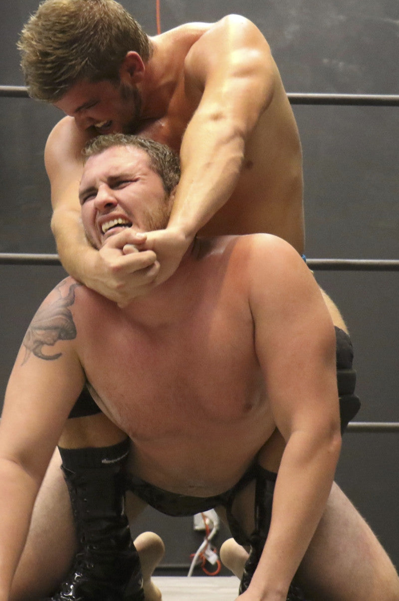 Billy the Kid camel clutch on NJustice arms tricep