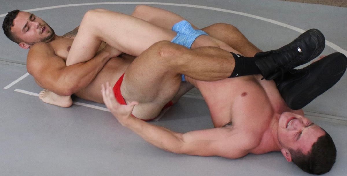 hot guys body scissor each other