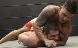 Marco headlock NJustice arms bicep tattoo