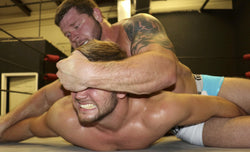 cross face submission hold Beast