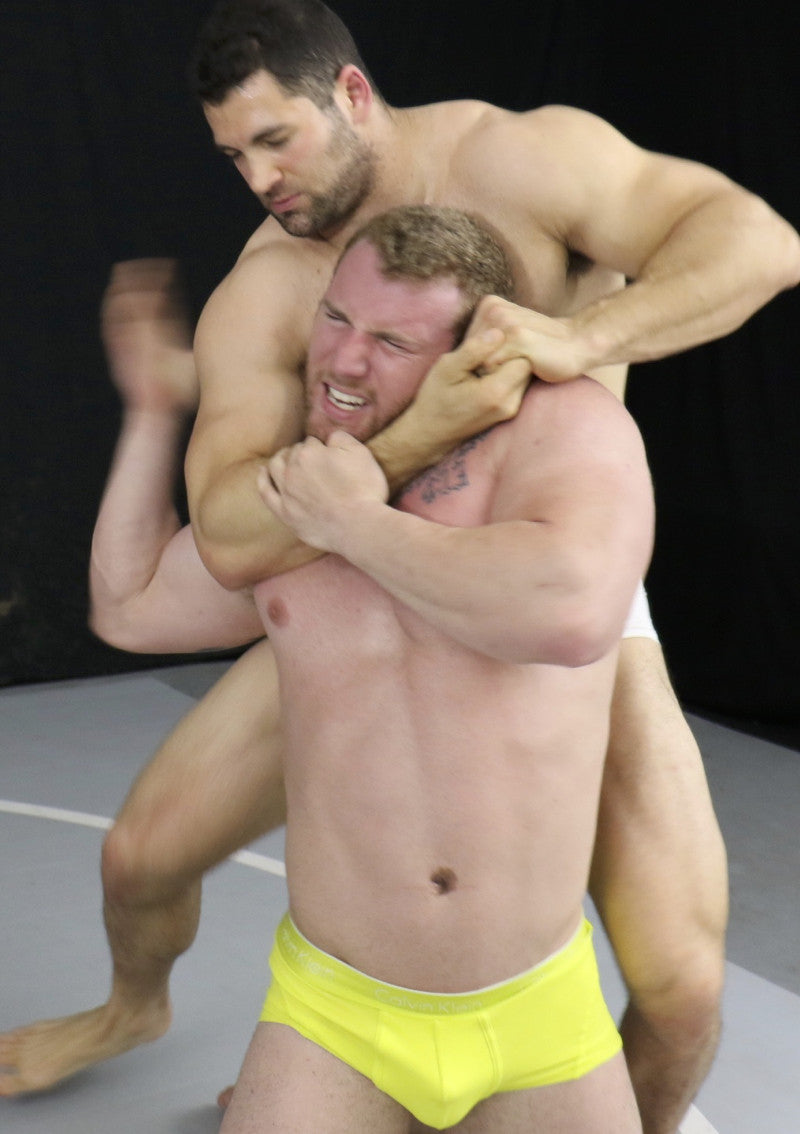 Vinny chokes out Talon with a rear chinlock in Thunders Arena