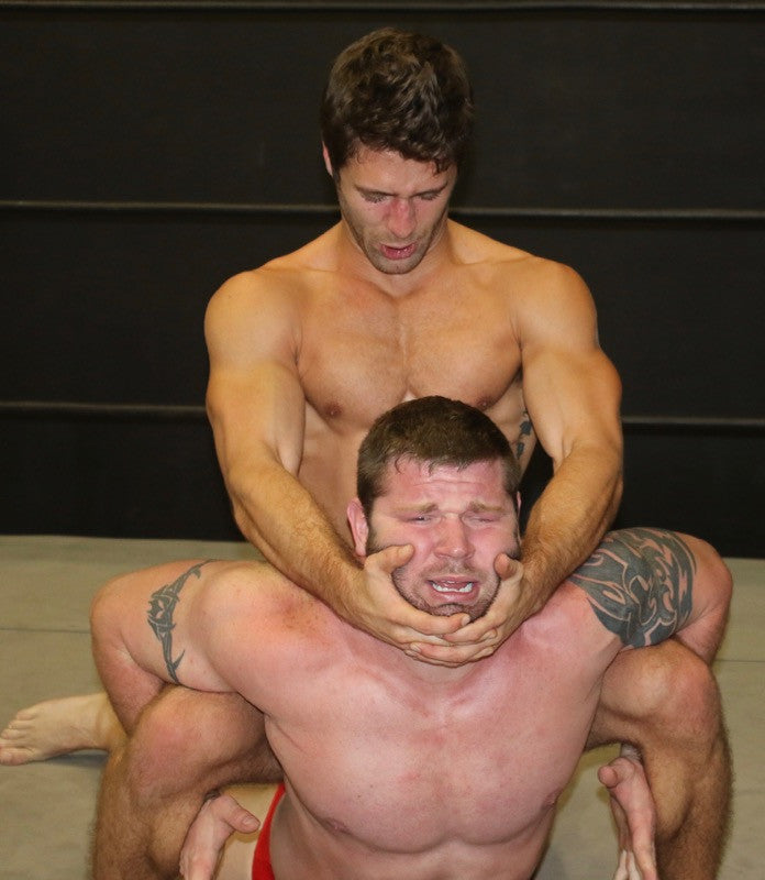 Blayne stretches Beast in a camel clutch at Thunders Arena