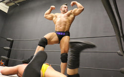 Brian Cage victory pose double bicep flex great abs