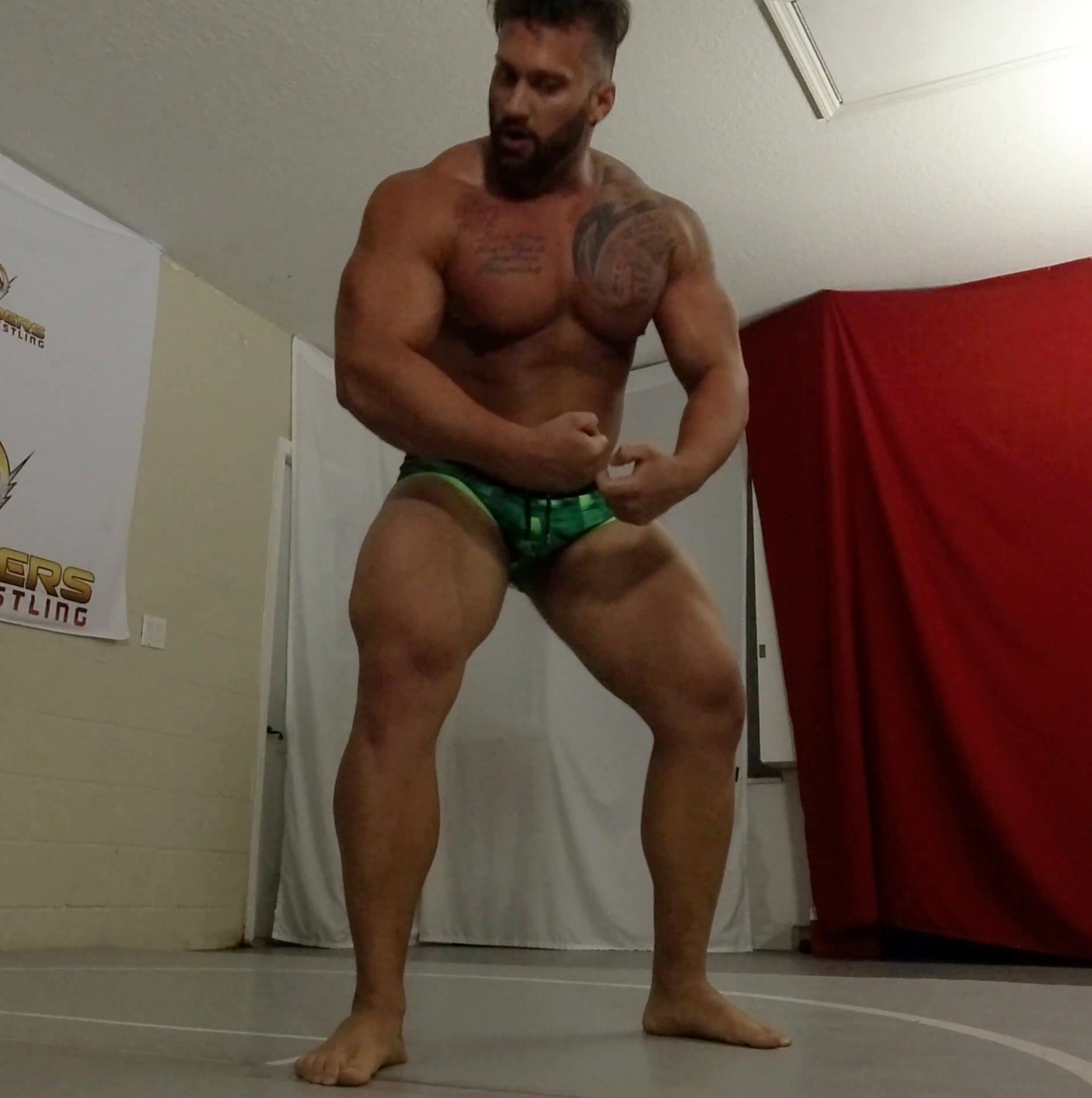 Stallion Flexing mid match